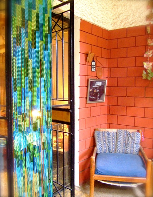 home staging mosaic blue green beaded room divider