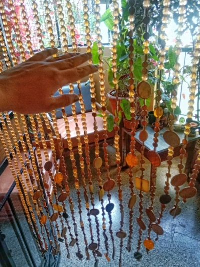 crystal beads in amber shades curtain for room decor